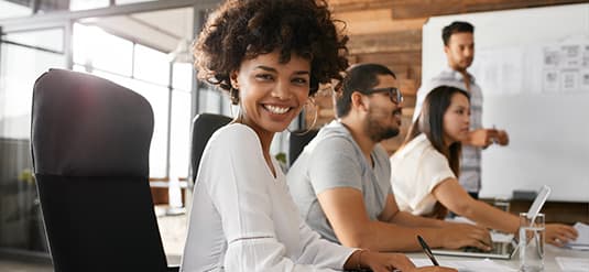 Purchasing professionals collaborating in a meeting